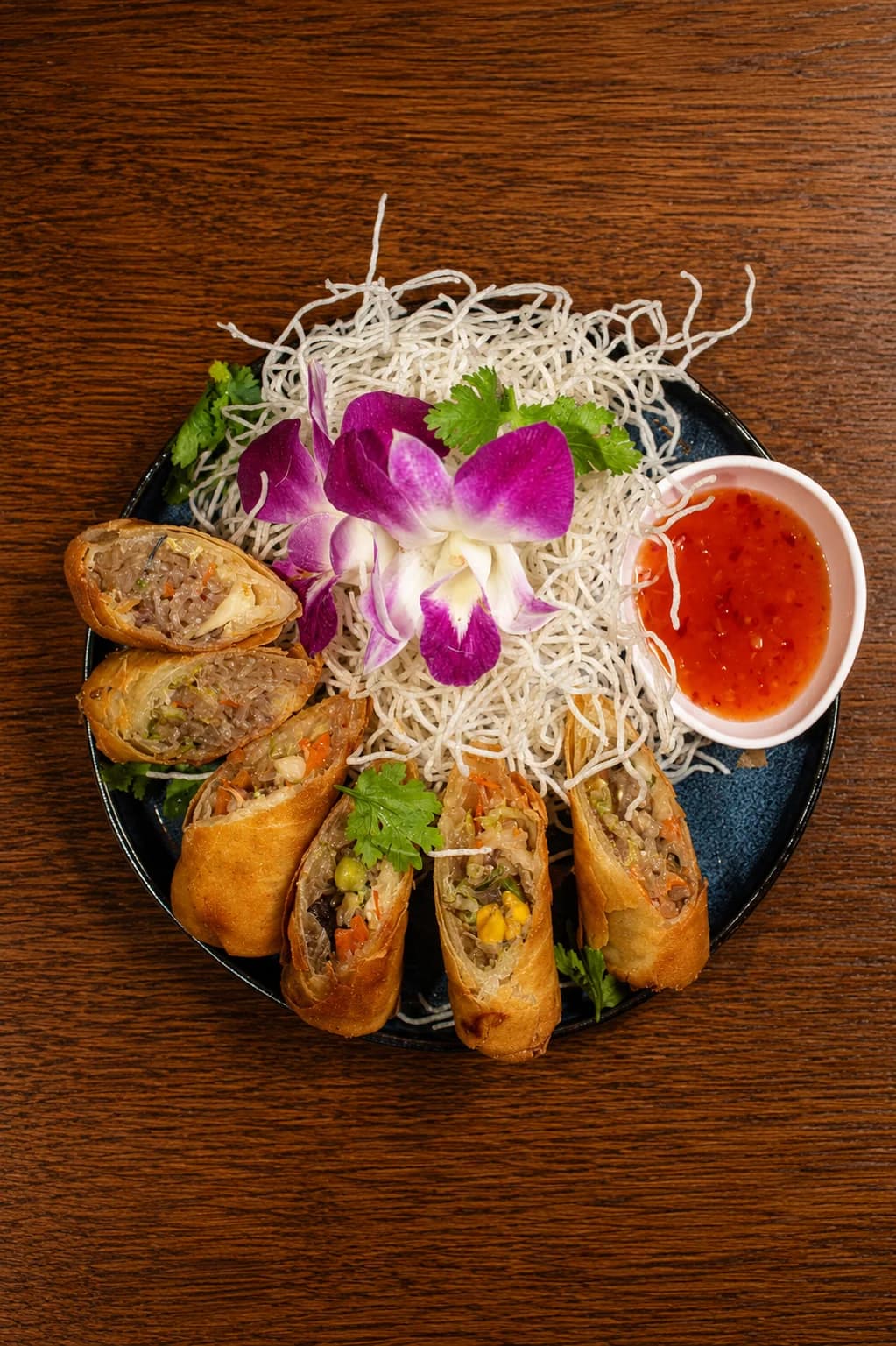 Spring rolls served with sweet chilli sauce at MESA
