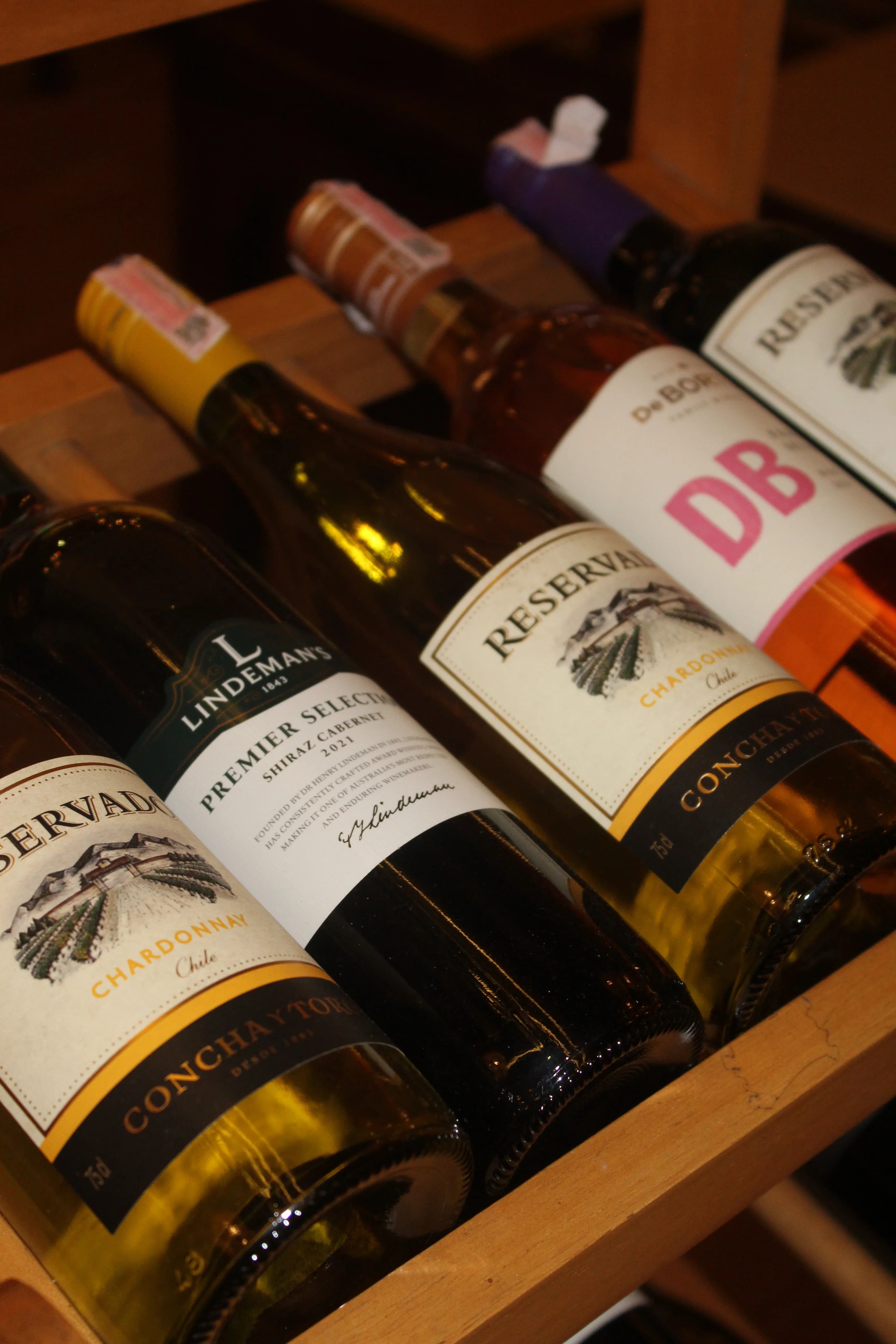Wine being poured at a softly lit MESA table