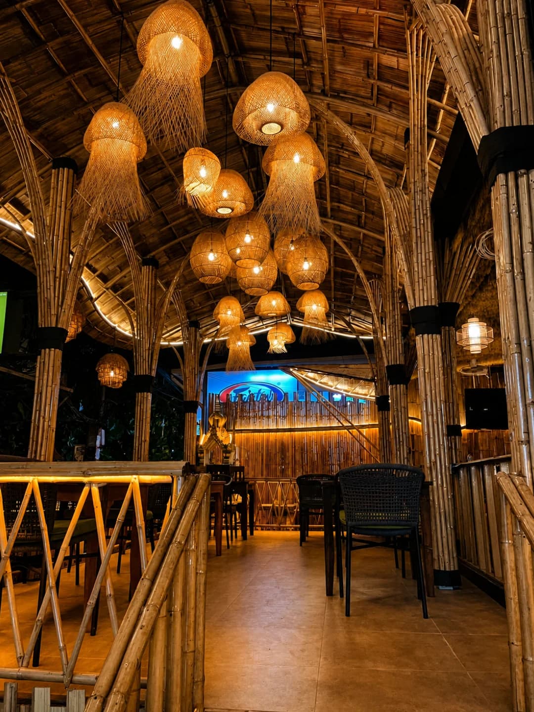 Woven pendant lamps down the length of the room